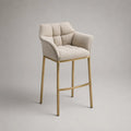 Sgabello bar con braccioli in poliestere beige e acciaio oro, altezza seduta 75 cm, 55 × 56 × 103 cm